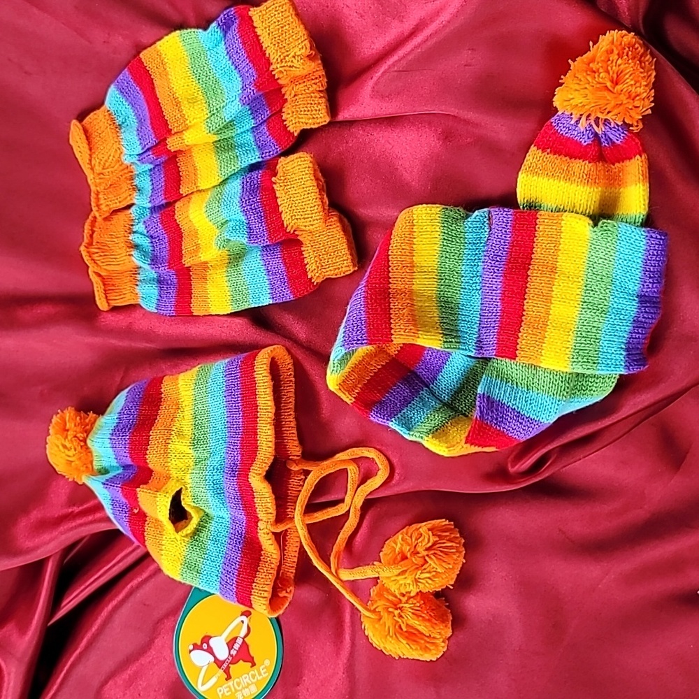Hat, scarf, legwarmer set for smallish dogs. Brand new with tags.